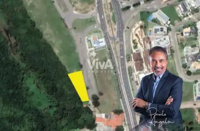 Terreno à venda na Avenida Litorânea, 2040, Cararu, Eusébio