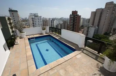 Cobertura com 305 m² de área útil, 4 vagas de garagem, amplo living, 4 dormitórios sendo 2 suítes