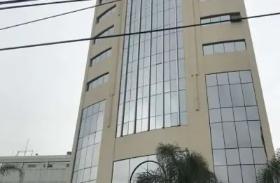 Sala comercial com 35m² de área útil. possui 2 banheiros, 1 vaga.