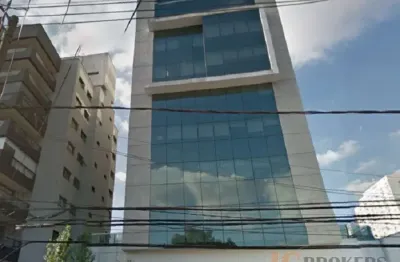 Sala comercial com 125 m² de área útil, prédio entregue em 2014, 3 banheiros, 4 vagas de garagem.