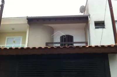 Lindo sobrado em região privilegiada, na Vila Scarpelli, 3 dormitórios, sótão, porão,  2 vagas, construção 180 m, 125 m de terreno