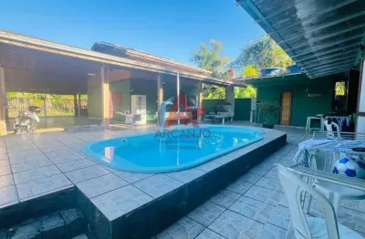 Casa a venda na praia do estaleiro proximo ao mar com edicula nos fundos