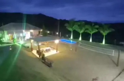 Chácara de muito bom gosto em condomínio fechado – paraibuna-sp