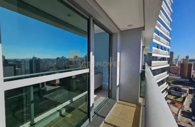 Studio a venda na região central de curitiba, vista panorâmica, sacada, 1 vaga.