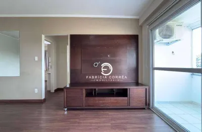 Apartamento com planejados, ar-condicionado e sala ampla em dois ambientes