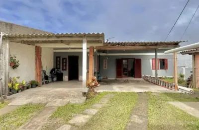 C126 duas casas em um só terreno no centro de mariluz!