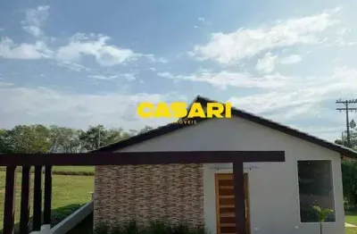 Casa com 3 dormitórios à venda, 133 m² - condomínio ninho verde i eco residence - porangaba/sp