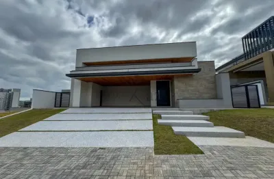 Casa térrea com área gourmet e piscina – colinas do paratehy – 3 suítes