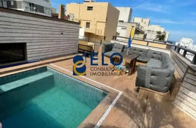 Cobertura duplex:-  três suítes, piscina, churrasqueira e duas vagas de garagens - vista para o mar, localizada  a 50 metros da praia.