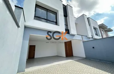 Sobrado geminado exclusivo com 3 suítes 2 vagas cobertas no iririú