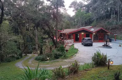 Oportunidade única em campos do jordão com 5 suítes e infraestrutura completa