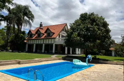 Imponente residência de luxo com 7 quartos e 5 suítes na vila giglio, atibaia-sp: 777m² de puro requinte!