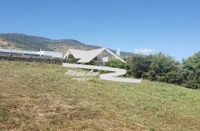 Terreno condomínio flamboyant com 1.050 m2 vista para pedra grande, aclive em relação a rua.  valor r$ 830 mil