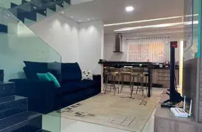 Sobrado lindo, todo mobiliado, 02 suítes em praia grande, lado praia.