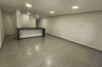 Casa geminada com dois dormitórios sendo uma suíte no caiçara em praia grande sp