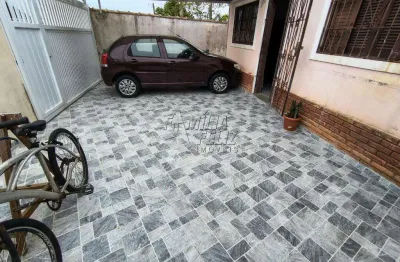 Casa à venda em praia grande, no bairro caiçara, com 1 dormitório à 399 metros da praia.