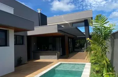 Linda casa nova para venda no charmoso vila do golfe, cond. quinta dos ventos, 4 suites, home, gourmet e piscina em 536 m2 de área total. lazer comple