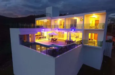 Magnifico sobrado para venda em escarpas do lago, linda vista, 5 suites, ampla varanda gourmet, piscina borda infinita e heliponto em 781 m2