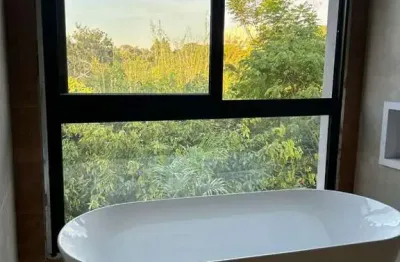 Casa fundo para mata com 3 suítes, jardim, escritório, piscina e fire place , 350 m² por R$ 1.999.000,00 - Condomínio Gran Reserve, Indaiatuba/Sp