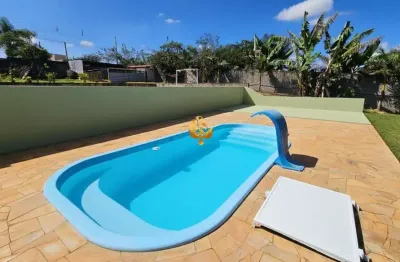 Chácara à venda em Taubaté-SP: 3 quartos, 1 sala, 2 banheiros em Loteamento Chácaras Ingrid - 1.250 m² de área.