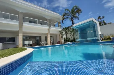 Linda casa de 5 quartos, 8 banheiros, 3 vagas na praia da enseada em guarujá sp