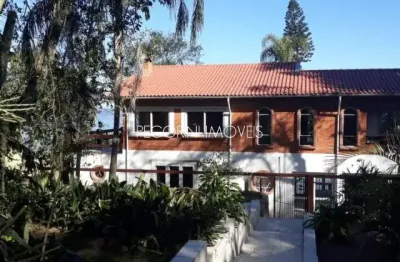 Casa com 4 quartos à venda na Rua Acácias, 405, Ponta Grossa, Porto Alegre