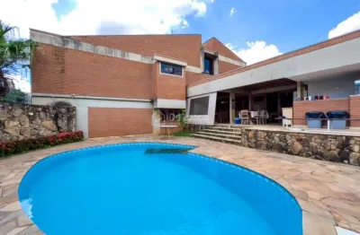 Casa com 4 quartos à venda na rua nazaré paulista, 493, jardim das paineiras, campinas, 570 m2 por r$ 1.700.000