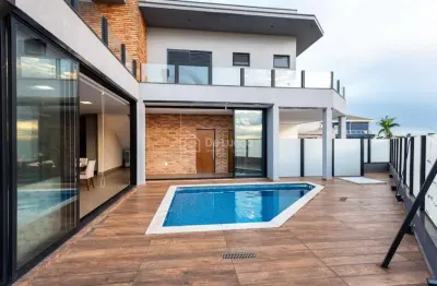 Casa em condomínio fechado com 4 quartos à venda na orlando silva, 920, parque brasil 500, paulínia, 260 m2 por r$ 2.100.000