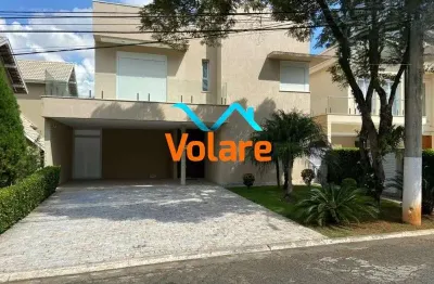Casa em condomínio de luxo à venda: 4 quartos, 4 suítes, 3 salas, 5 banheiros, 4 vagas de garagem e 320m²