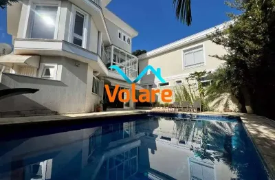 Imóvel de alto padrão com 4 suítes no residencial valville 1 em santana de parnaíba/sp: 369m², 6 vagas.
