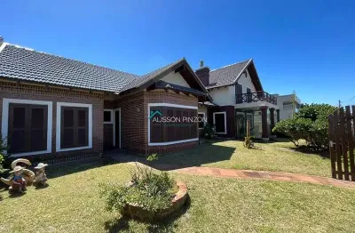 Residência de alto padrão com vista para praia e 04 terrenos.