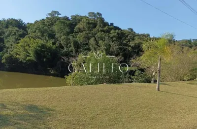 Terreno á venda em condomínio laguna residencial clube em várzea paulista - sp