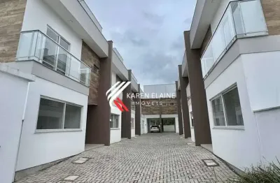 Sobrado à venda com 02 suítes em condomínio fechado no bairro Nova Palhoça.