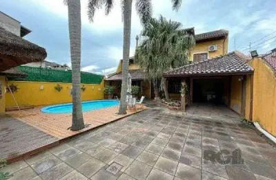 Casa em porto alegre, no bairro guarujá, com 3 dormitório(s), e 3 banheiros, à venda.