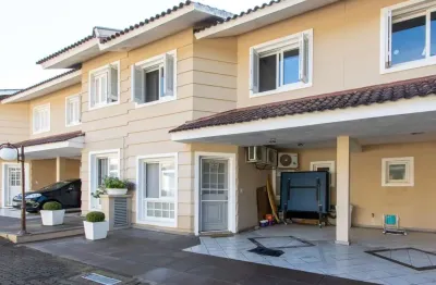 Casa em condomínio, com 3 quartos, com suíte, 2 vagas cobertas, churrasqueira, no bairro nonoai.