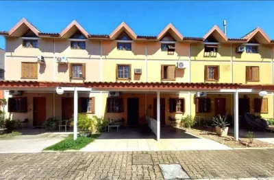 Casa em condomínio fechado com 3 quartos à venda na Rua Sílvio Silveira Soares, 2406, Camaquã, Porto Alegre