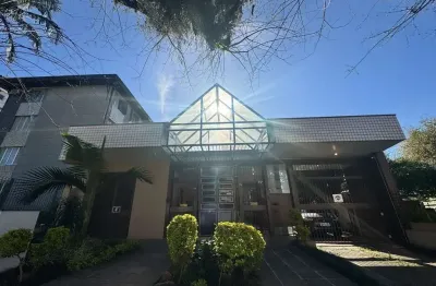 Apartamento dois dormitórios ( uma suíte) garagem/depósito bairro menino deus