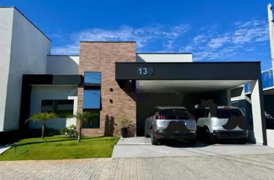 Casa em condomínio à venda em tremembé-sp  3 quartos, 2 suítes, 2 salas, 2 vagas de garagem  215m²  residencial parque das araucárias
