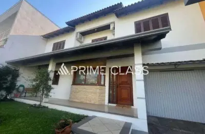 Casa com 5 quartos à venda na rua das petúnias, 144, loteamento bela vista, canoas por r$ 1.129.990