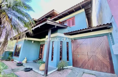 Casa com 4 quartos à venda na rua tenente antônio joão, 228, loteamento bela vista, canoas por r$ 1.350.000