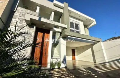 Casa com 3 quartos à venda na rua doutor joão césar, 31, mont serrat, canoas por r$ 1.680.000