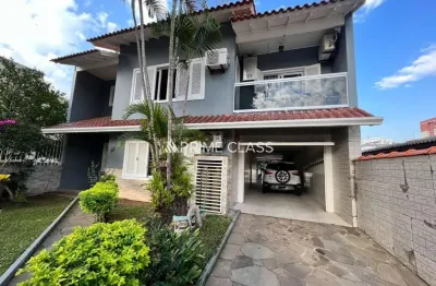 Casa com 4 quartos à venda na rua quinze de novembro, 181, nossa senhora das graças, canoas por r$ 1.380.000