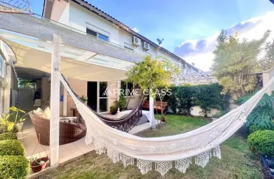 Casa em condomínio fechado com 3 quartos à venda na avenida açucena, 650, moinhos de vento, canoas por r$ 949.990