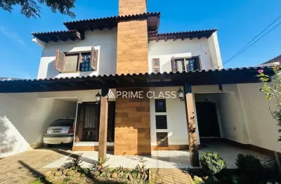 Casa com 4 quartos à venda na rua irmão guilherme, 225, marechal rondon, canoas por r$ 1.275.000