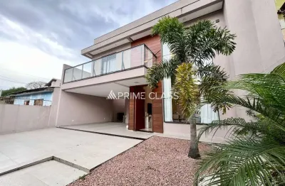 Casa com 3 quartos à venda na rua machado de assis, 280, harmonia, canoas por r$ 1.170.000
