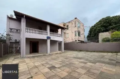 Casa com 4 quartos à venda na Rua Fonseca Ramos, 127, Medianeira, Porto Alegre