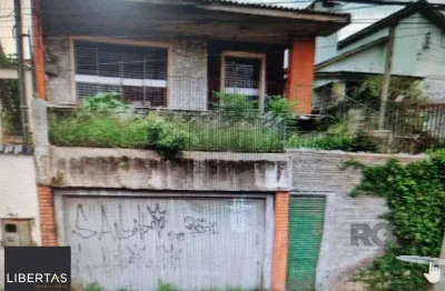 Casa com 3 quartos à venda na Avenida Coronel Gastão Haslocher Mazeron, 447, Medianeira, Porto Alegre
