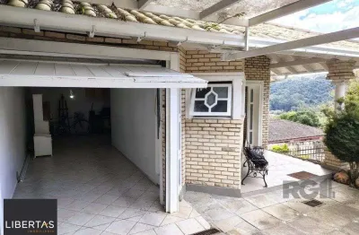 Casa com 3 quartos à venda na Rua Altos da Amapá, 120, Vila Nova, Porto Alegre