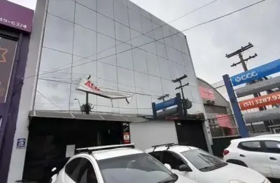 Prédio comercial no bairro navegantes, com 1.200m², 20 vagas.