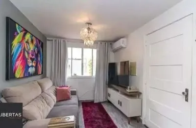 Casa em condomínio fechado com 2 quartos à venda na Rua Tenente Ary Tarrago, 1720, Jardim Itu Sabará, Porto Alegre